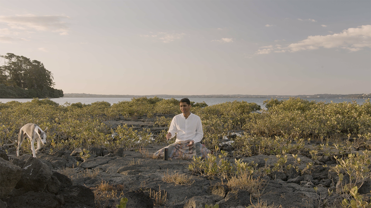 Image: Balamohan Shingade, Raga Puriya Dhanashree (video still), 2022. Meola Reef Dog Park, Tāmaki Makaurau.