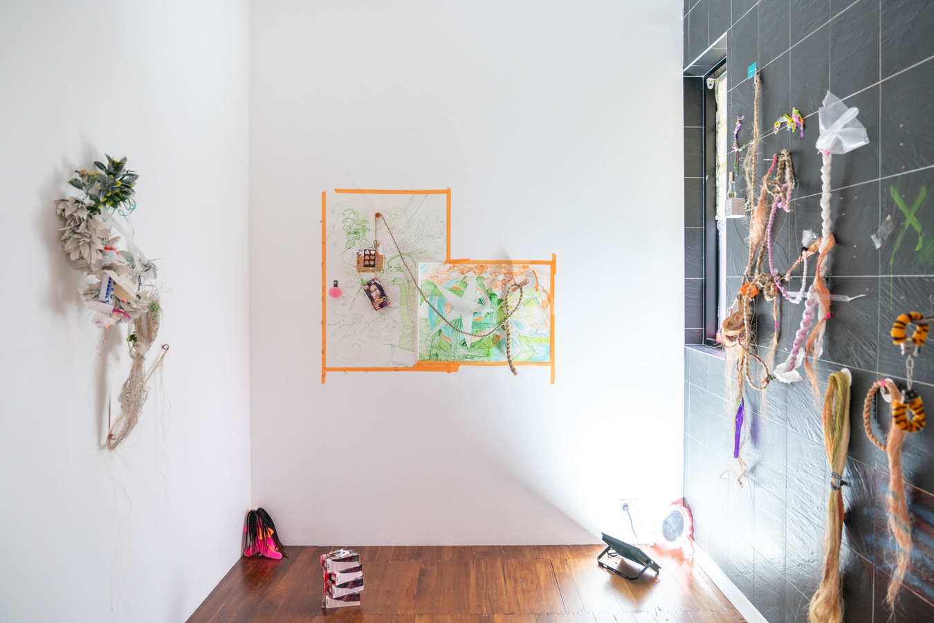 Abigail Aroha Jensen, install view with Vanity Kit and Rachel Dolezal, both 2025. Photo by Bri Lawrence.