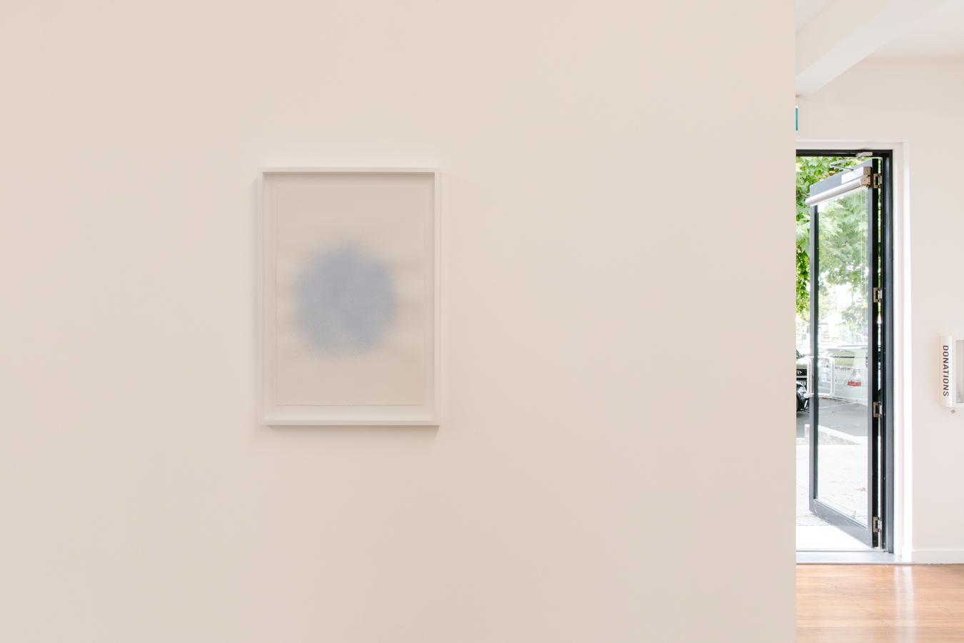 Image: D Harding, From the series Three Light Blue Breaths (installation view), 2022. Ultramarine blue, terra verde and pigment on 185gsm hot-pressed Arches Aquarelle paper. Private collection. Photo by Nancy Zhou.