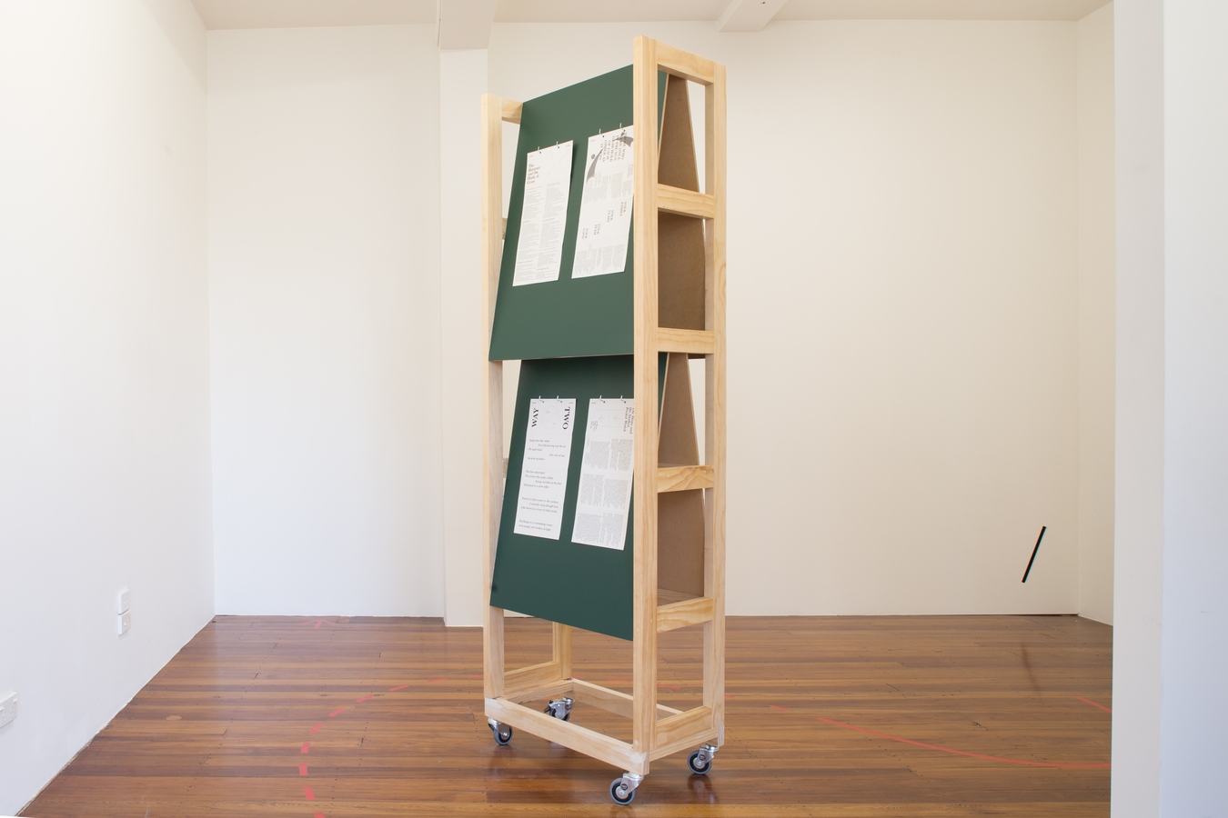 Image: Daniel Shaskey, System to System (installation view), 2019-2020. Digitally printed take home publication and timber kiosk. Photo: Janneth Gil.