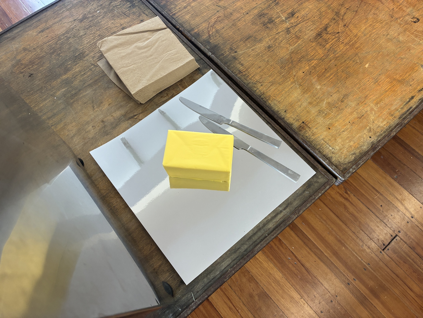 Lee Richardson, Another School (install detail), butter, napkins, 2026