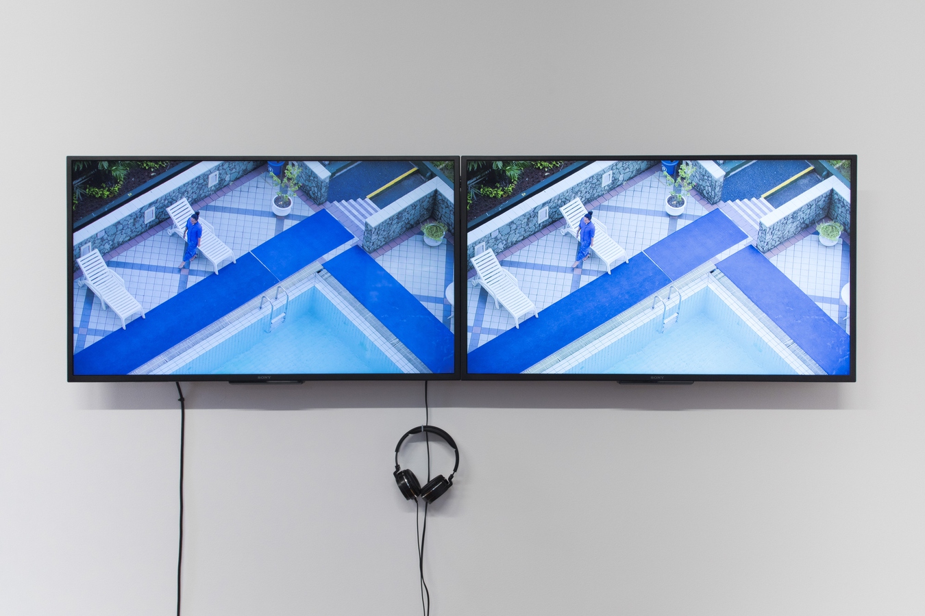 Ari Angkasa, Quantum Leap, 2024, two-channel digital video with sound (install view). Image by Janneth Gil.