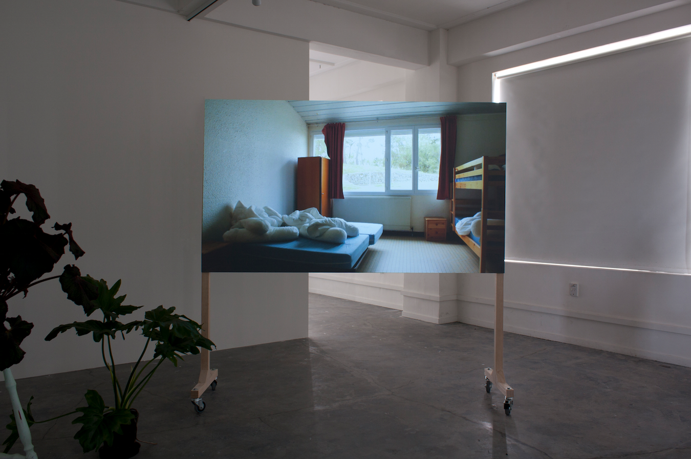 Alex Martinis Roe, It was an unusual way of doing politics: there were friendships, loves, gossip, tears, flowers..., Super 8 transferred to digital and HD video (10:43), installation view, 2014.