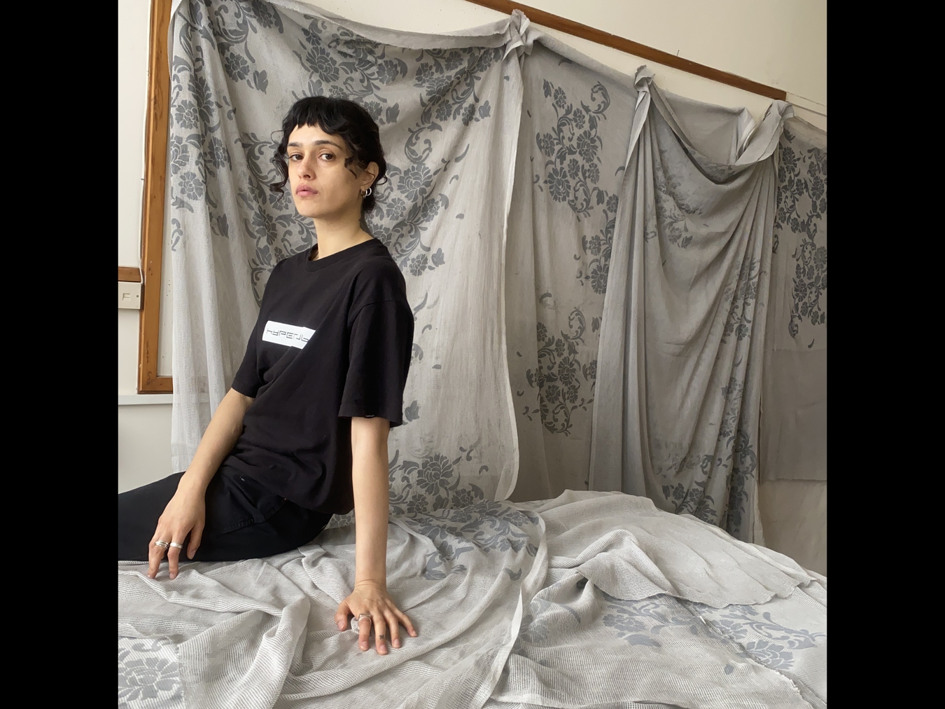 Ilish Thomas, artist portrait in studio