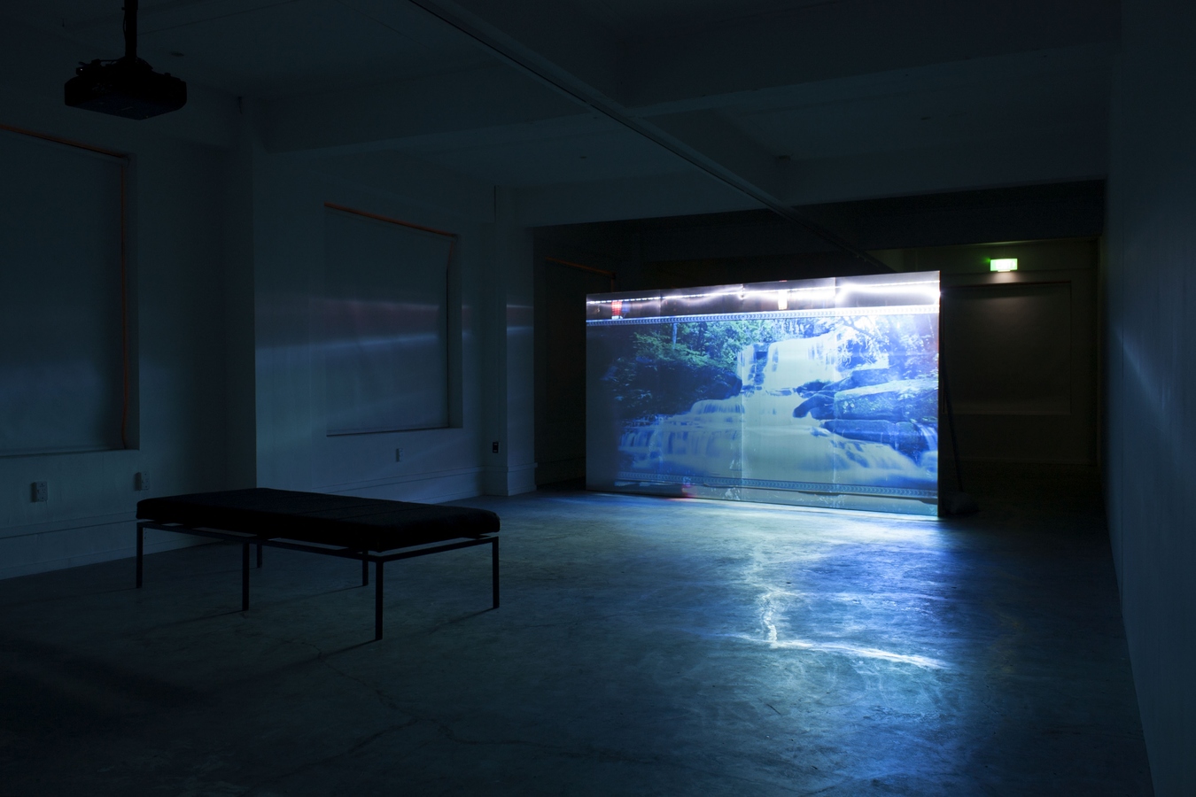 Lim Sokchanlina, Urban Street Night Club, 2013, installation with metal and wooden screen, single-channel video with sound, 16 minutes 16 seconds. Photo: Daegan Wells