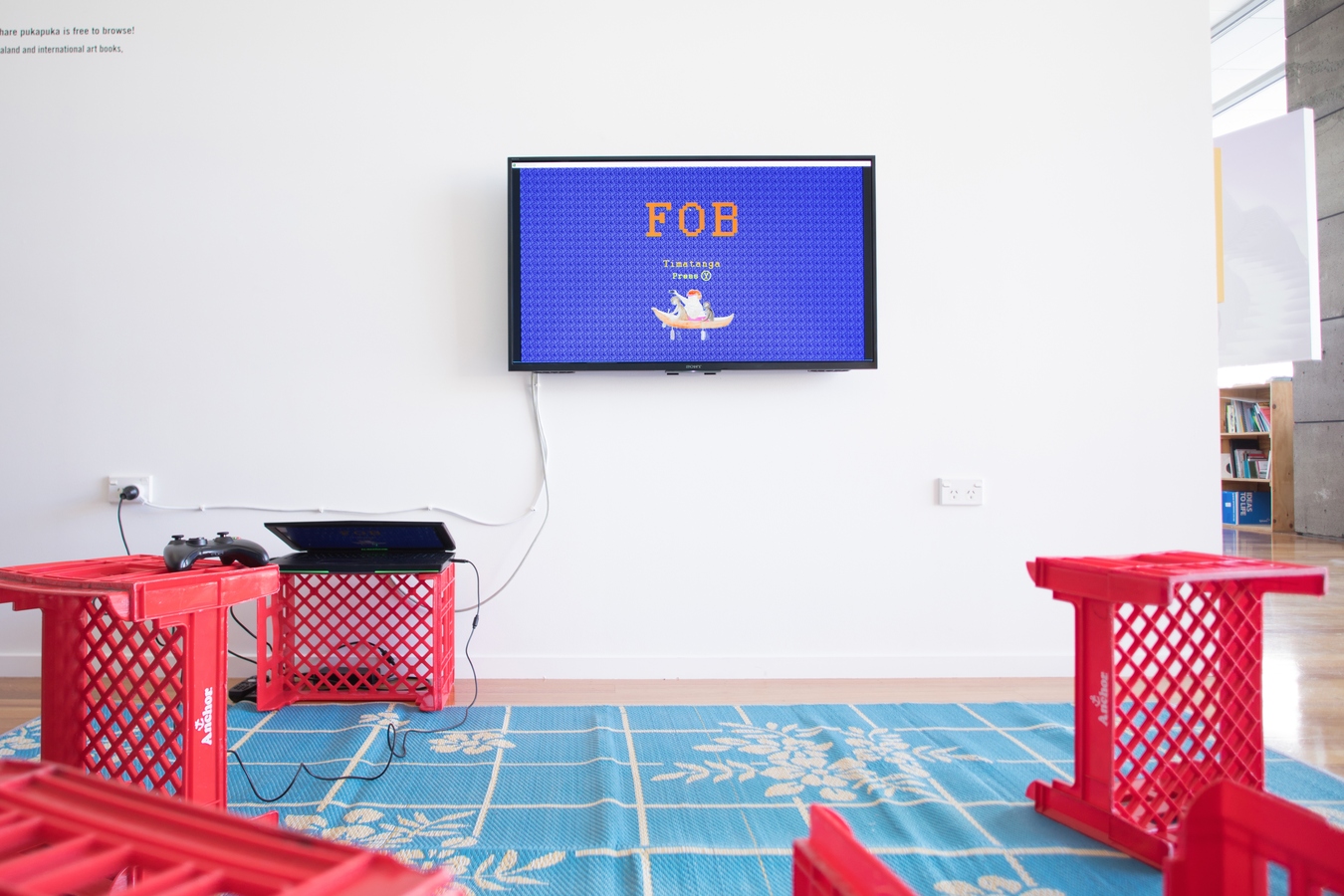 Image: Kahurangiariki Smith, FOB (installation view), 2016, video game, TV, controller, milk crates, mat. Interactive installation. Photo: Janneth Gil.