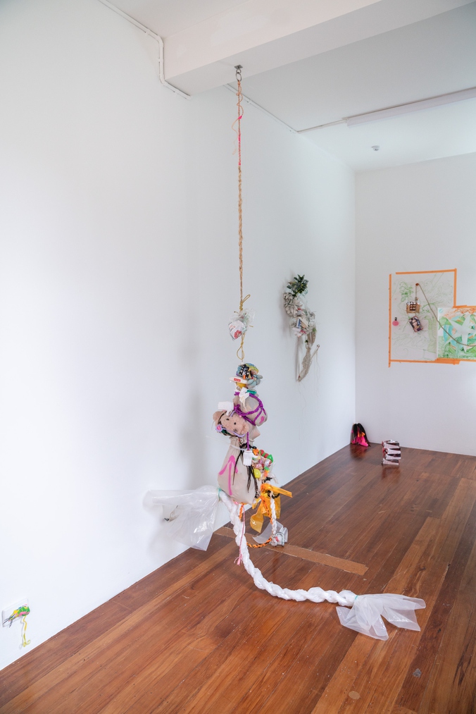 Abigail Aroha Jensen, install view with Vanity Kit and Rachel Dolezal, both 2025. Photo by Bri Lawrence.