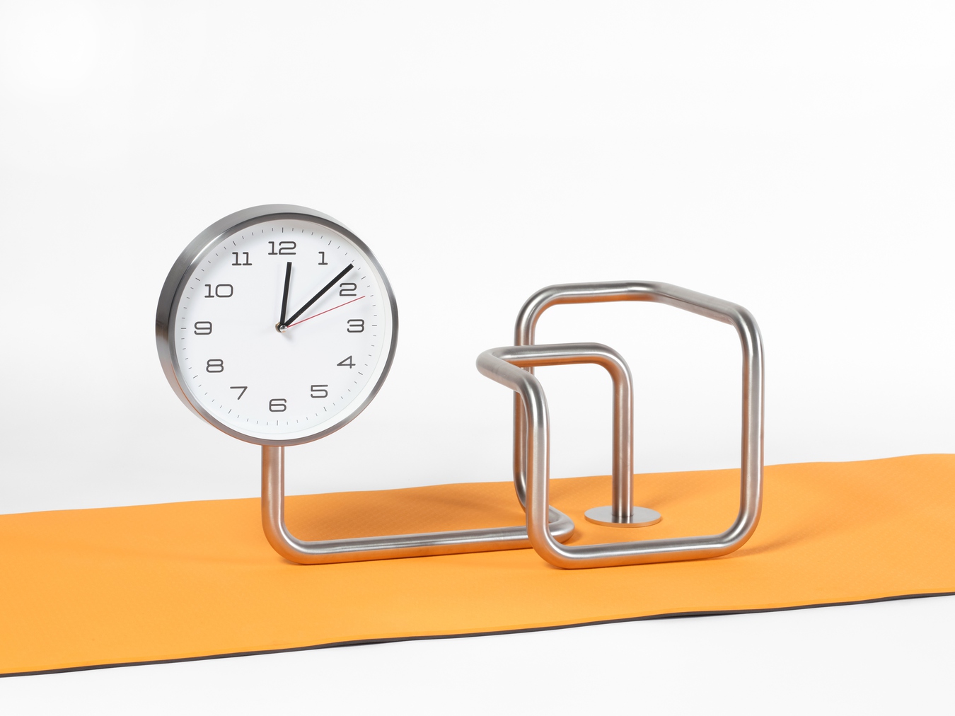 Image: Yona Lee, Clock in Practice, 2023. Clock, stainless steel. 68 x 29 x 40cm. Photo by Sam Hartnett. Courtesy of the artist and Fine Arts, Sydney.